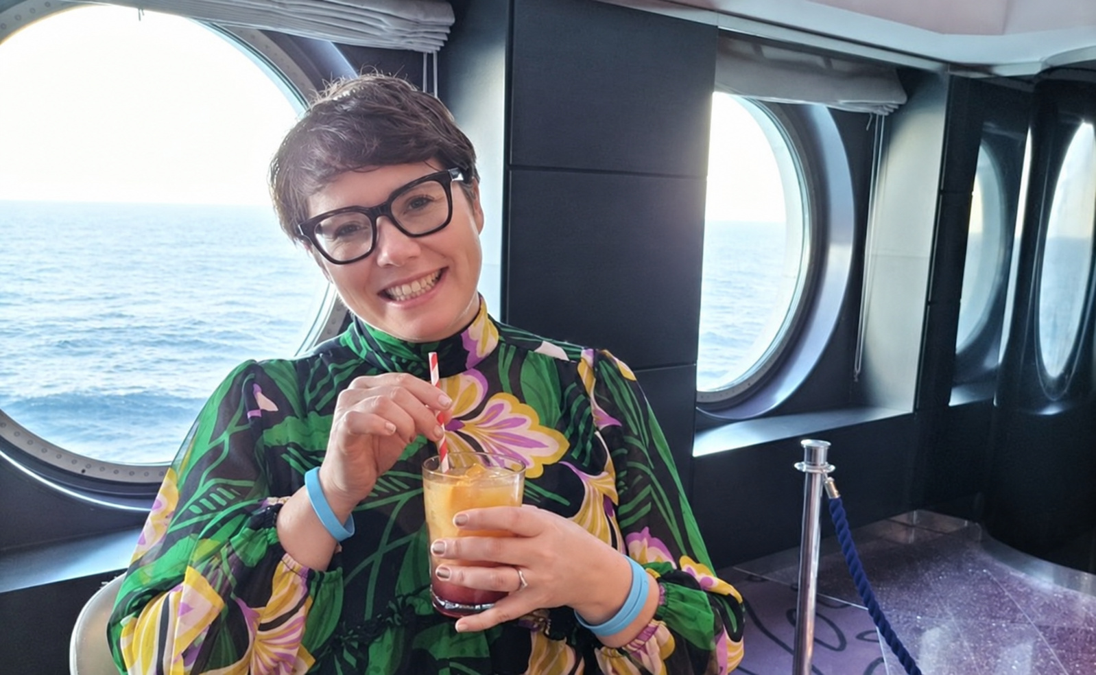 Liz enjoying a moment onboard a cruise ship