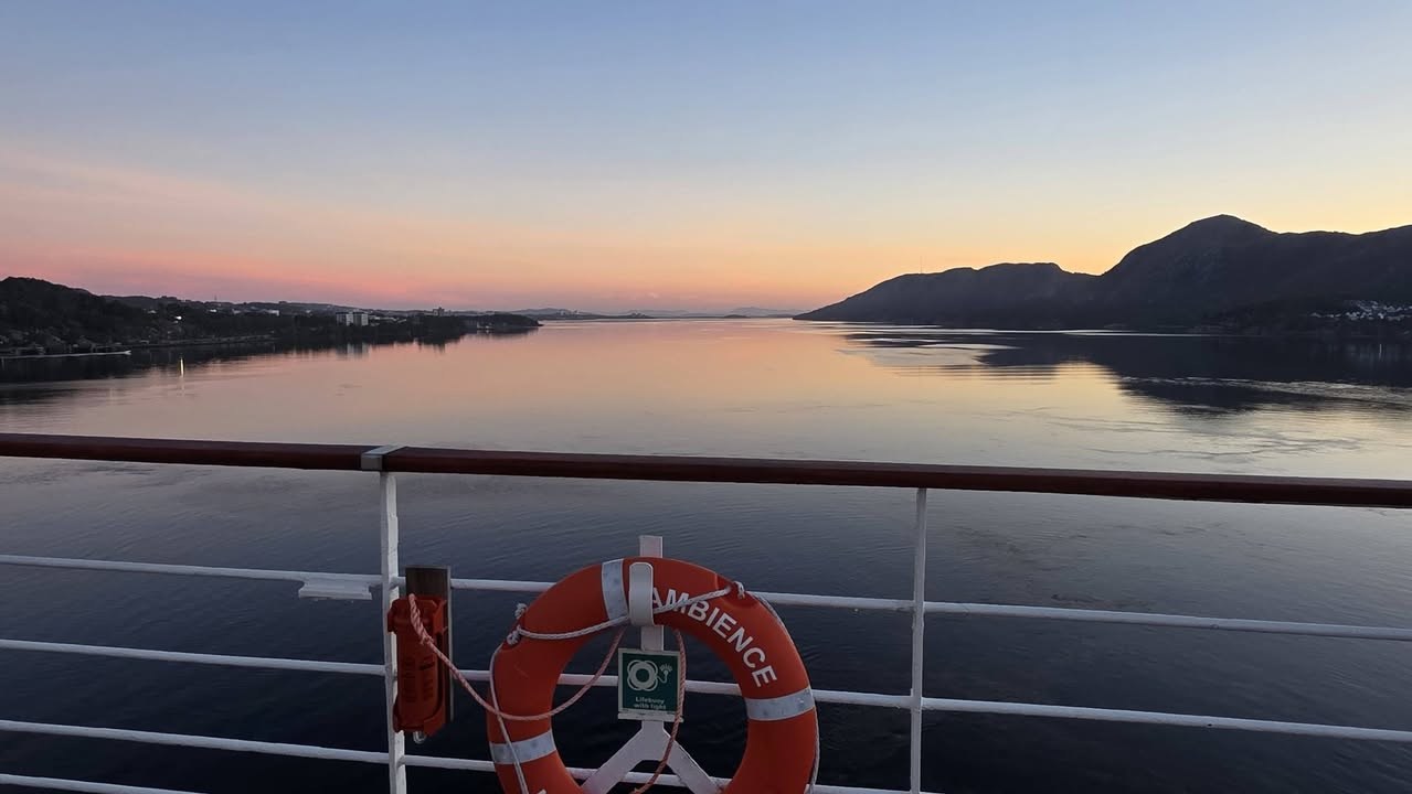 Evening light over the fjord from the ship’s deck